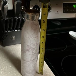 TAL insulated metal water bottle about 11” tall white marble colored